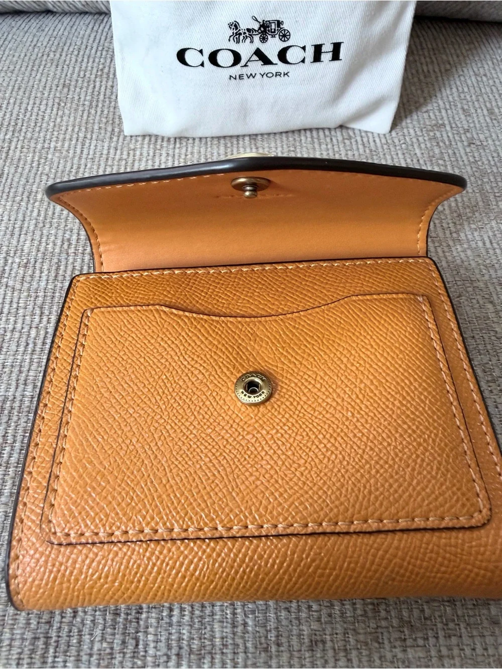 Coach Orange Leather Compact Wallet with Gold 'C' Hardware